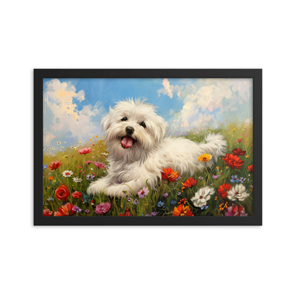 A happy coton de tulear sits on a grass hill with wildflowers.