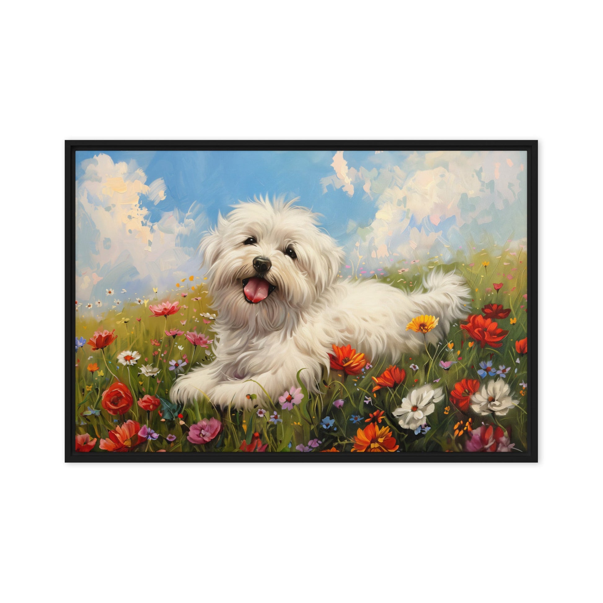 A happy coton de tulear sits on a grass hill with wildflowers.